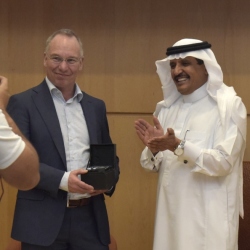 Alfaisal President HE Dr Mohamed Alhayaza presents a souvenir to KFIP winner Prof.Han Brunner